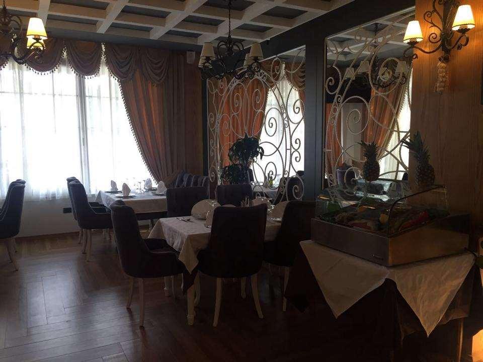 Hotel Mustang Vasqarr Restoran fotoğraf